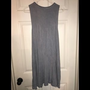 Cute Can be worn as a dress or with leggings.